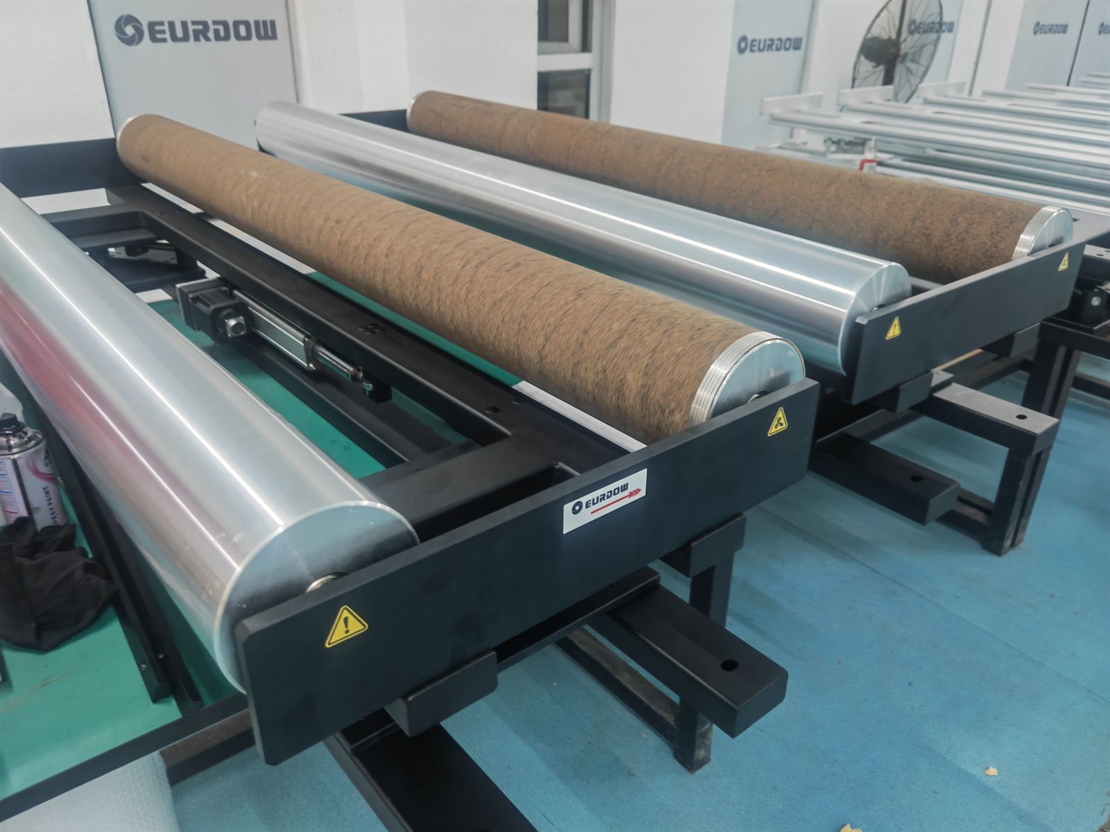 Wide split guide frame with cork-covered rollers